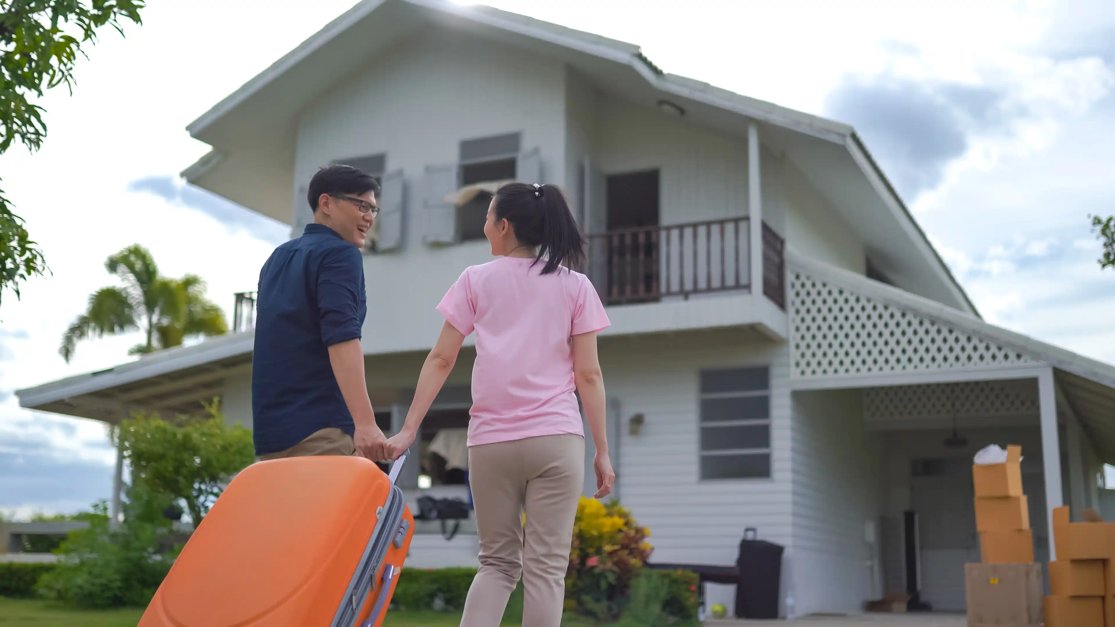 Young couple moving into their first house